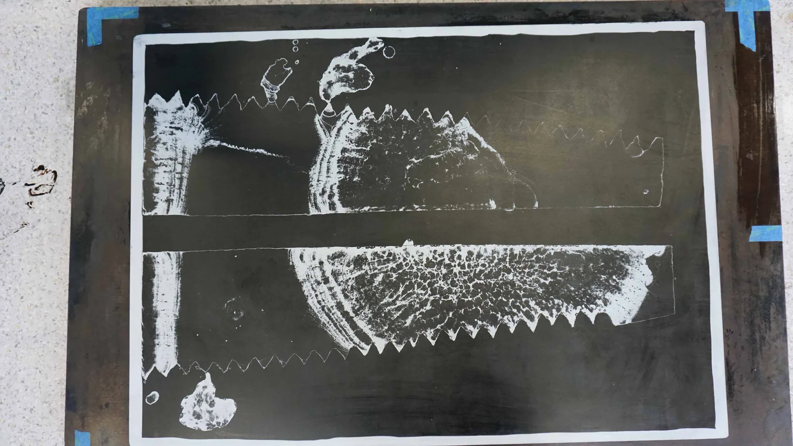 Etched drawing on aluminium plate.